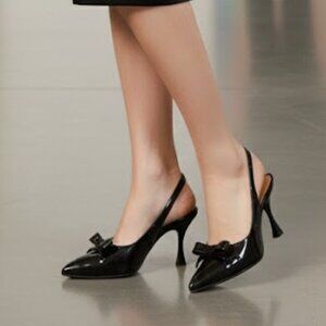 Midnight Chic: Black Patent Pointed-Toe Pumps with Bow Detail & Sculpted Kitten